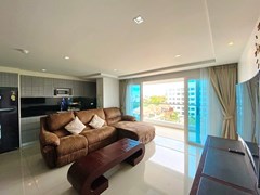 Condominium for rent Pratumnak Pattaya showing the living area and balcony 