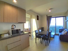 Condominium for rent UNIXX South Pattaya showing the kitchen, dining and living areas 