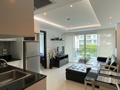 Condominium for rent Pattaya showing the kitchen, dining and living areas 